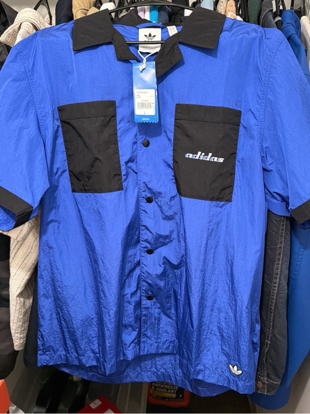 Adidas TGP SS shirt. Blue and Black Windbreaker button up shirt with patches